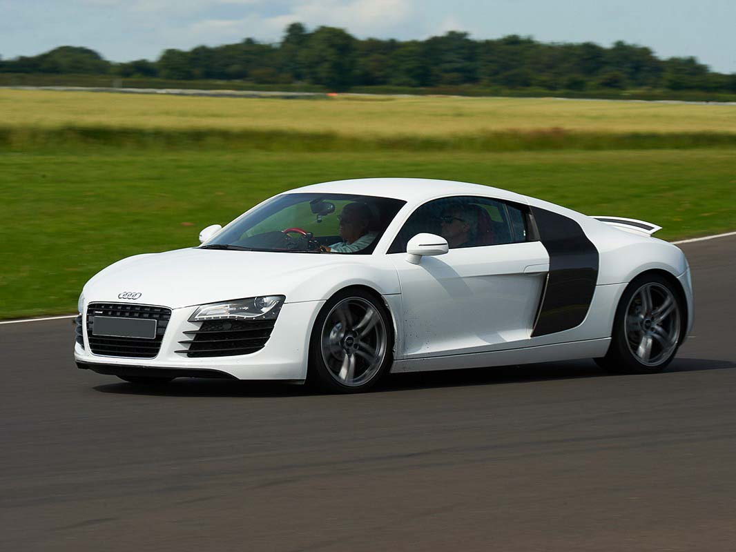 The Audi R8[2] is a mid-engine, 2-seater sports car,[2][3] which uses Audi's trademark quattro permanent all-w...